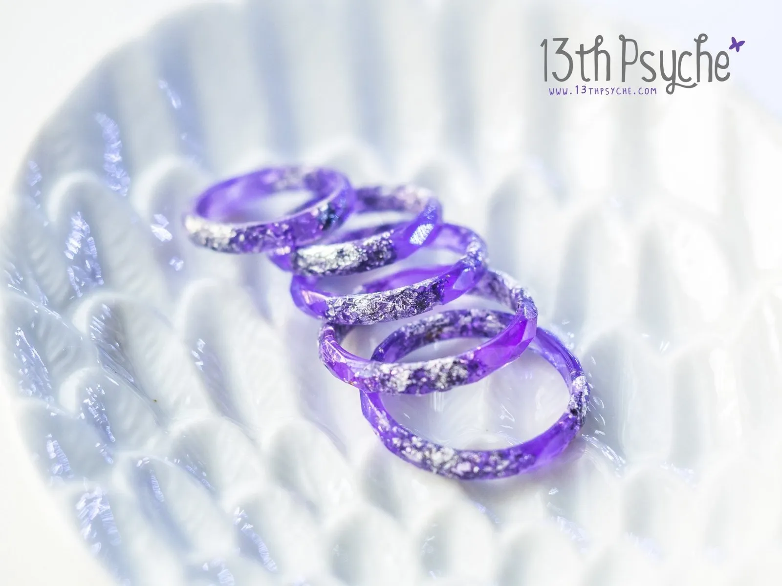 Purple and silver flakes faceted resin ring